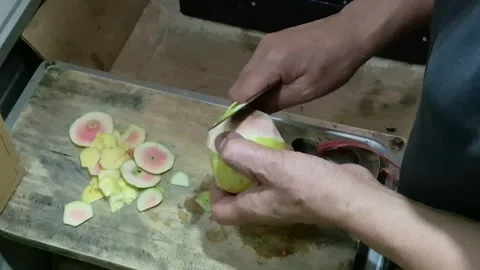 Peeling guava skin Stock Footage 312732716