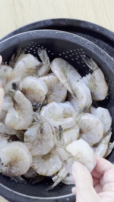 Peeling large shrimp vertical Stock Footage 219289546