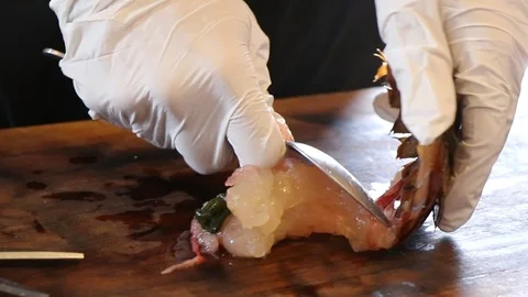 Peeling Lobster by the hands with rubber gloves. 스톡 동영상 124681789