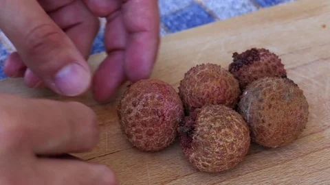 Peeling Lychee Fruit. Stock Footage 80468831