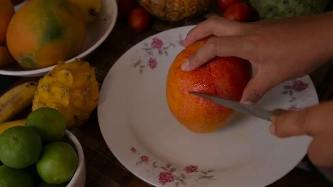 Peeling a mango Stock Footage 103033459