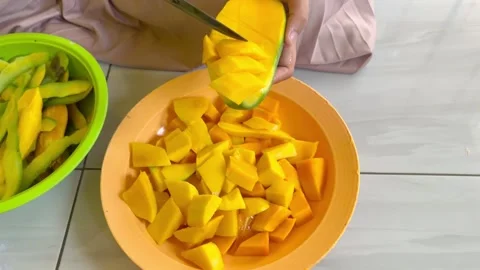 Peeling a Mango with a Knife Stock Footage 292727635