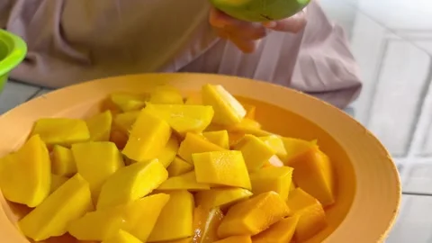 Peeling a Mango with a Knife Stock Footage 292727702
