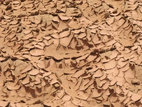 Peeling mud cracks Stock Photos