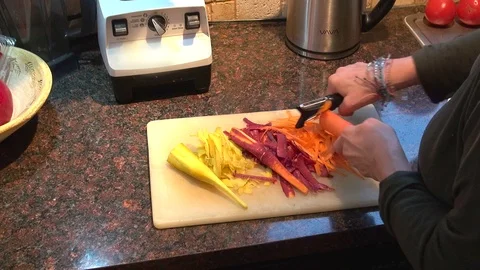 Peeling multi-color carrots Stock-Footage 119619012