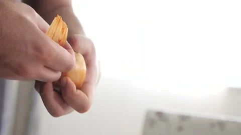 Peeling an onion Stock Footage 137211316