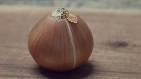 Peeling an onion Stock Footage 147700132