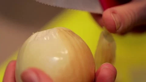 Peeling onion in slow motion Stock Footage 149118650
