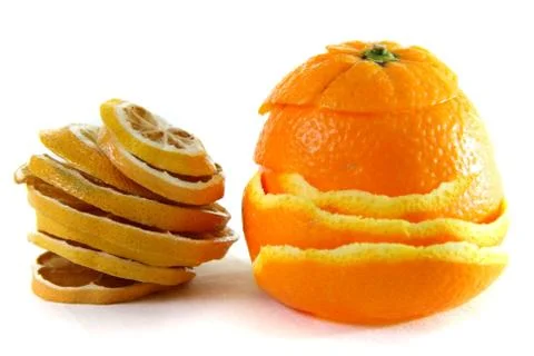 Peeling orange and sliced dried orange Stock Photos