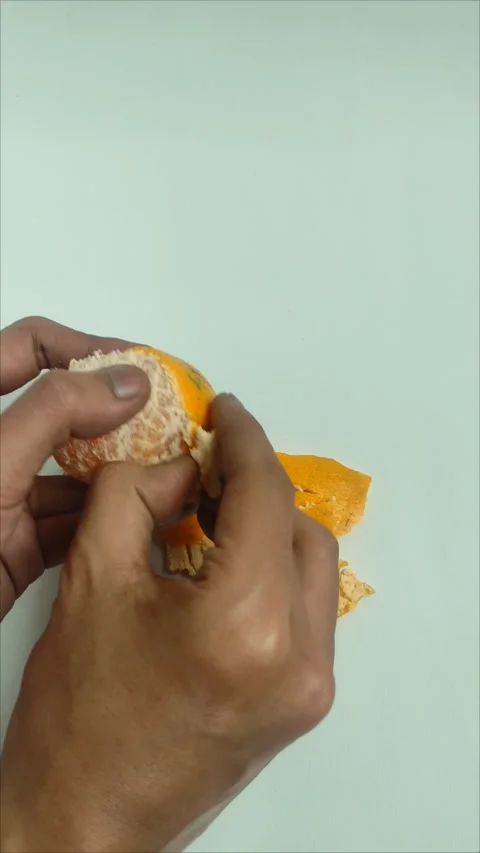 Peeling orange fruit Stock Footage 317629182