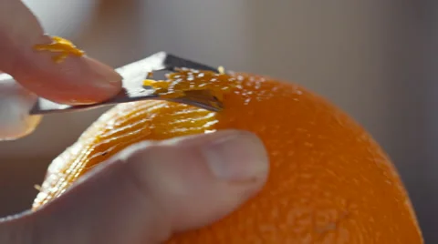 Peeling orange zest Stock Footage 63264986