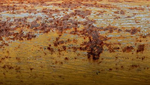 Peeling paint and rust on iron Stock Photos