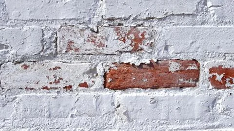 Peeling paint on brick Stock Photos