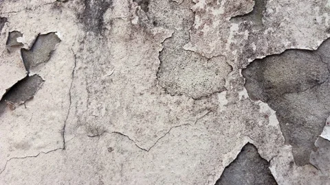 Peeling paint on cement render wall texture close up Stock Footage 328961594