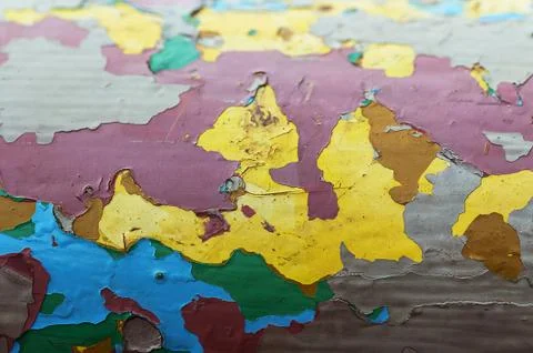 Peeling paint. Colored layers. Stock Photos