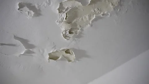 Peeling paint on house ceiling due to moisture and humidity in closed room Stock Footage 268801262