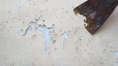 Peeling a paint on an old house wall. Stock Footage 79594400