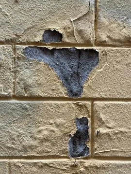 Peeling Paint on Old Stone Wall Stock Photos