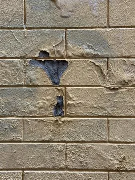 Peeling Paint on Old Stone Wall Stock Photos