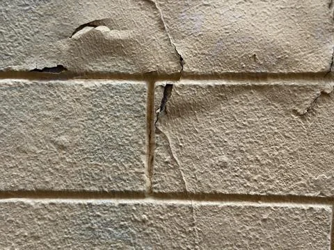 Peeling Paint on Old Stone Wall 写真素材