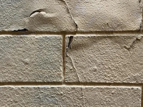 Peeling Paint on Old Stone Wall Stock Photos