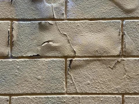 Peeling Paint on Old Stone Wall Stock Photos