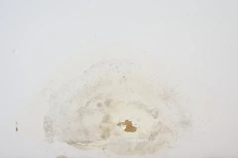 Peeling paint from rain on old ceiling Stock Photos