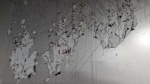 Peeling paint on vintage surface. Pattern of rustic grunge material Stock Photos