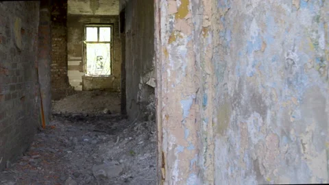 The peeling paint of the wall of the abandoned house Stock Footage 140150502