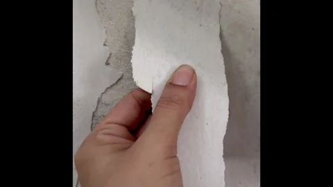 Peeling paint off wall.On drywall and old plaster ceiling.expire coated.rel.. Stock Footage 318287004