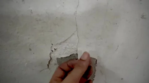 Peeling paint off wall.On drywall and old plaster ceiling.expire coated.rel.. Stock Footage 318287019