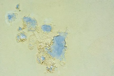 Peeling paint on the wall. Stock Photos