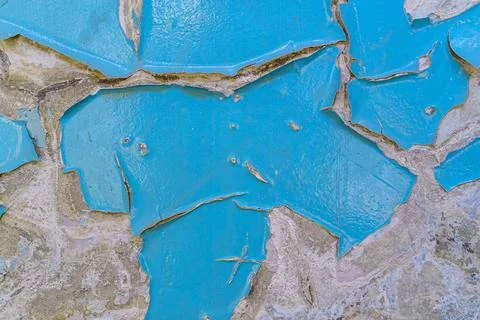 Peeling paint on wall texture. Pattern of rustic blue grunge material Stock Photos