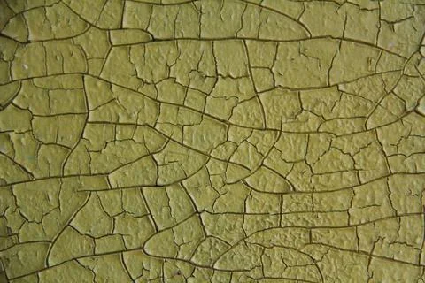Peeling paint on the wall. wall with old cracked flaking paint. Weathered rou Stock Photos