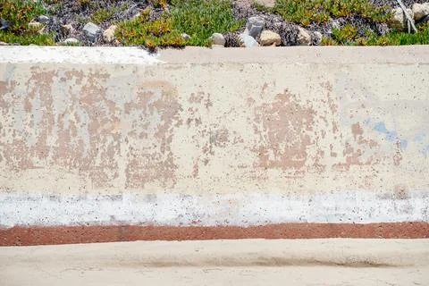 Peeling painted wall on the beach Stock Photos