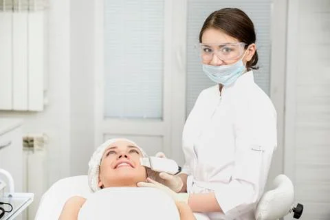 Peeling patient's face Stock Photos