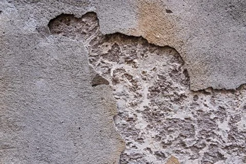Peeling plaster concrete wall. Stock Photos