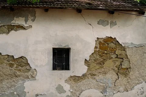 Peeling Plaster on Stone Wall Stock Photos