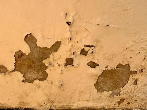Peeling plaster wall texture Stock Photos