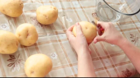 Peeling potato Stock Footage 925992