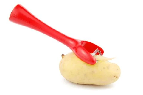 Peeling a potato Stock Photos