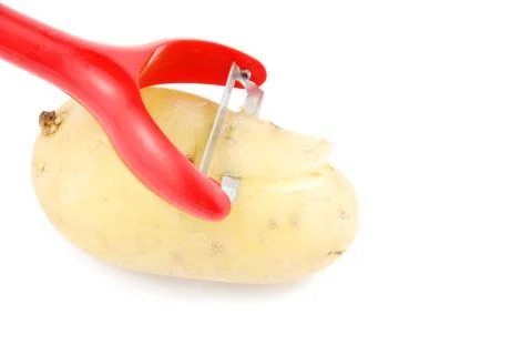 Peeling a potato Stock Photos