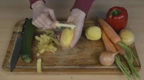 Peeling potatoe Stock Footage 22098952