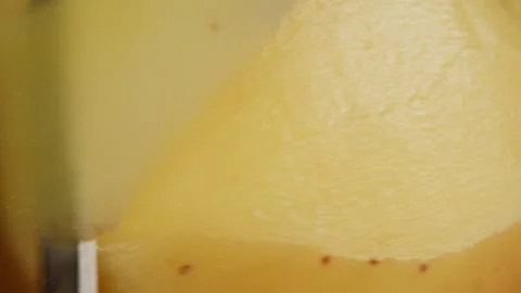 Peeling potatoes with grater close-up. Preparing some vegetables for cooking Stock Footage 264938270
