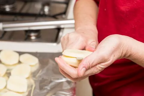 Peeling potatoes Stock Photos