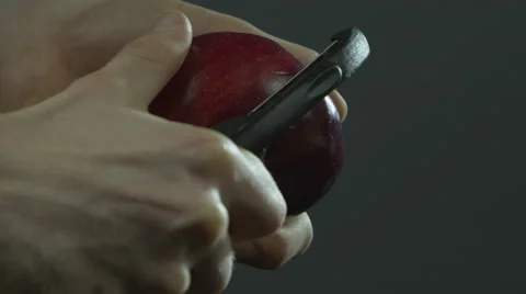 Peeling a red apple Video stock 67359198