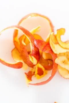 Peeling red apples Photos