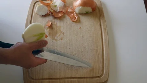 Peeling a red onion Stock Footage 79275511