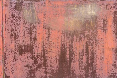 Peeling red paint. dirty profiled metal sheet. rusty metal Stock Photos