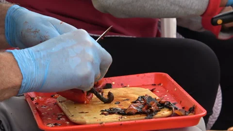 Peeling Roasted Red Peppers, Stock Footage 141061226